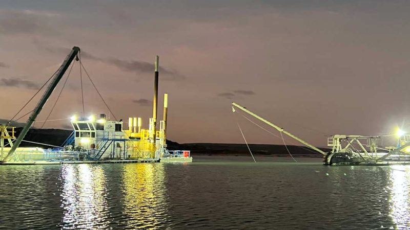 Dredge 6 and 7 side by side at night